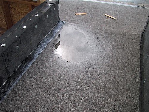 Roof ponding damages