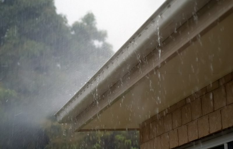 Gutter damage showing rain on gutter